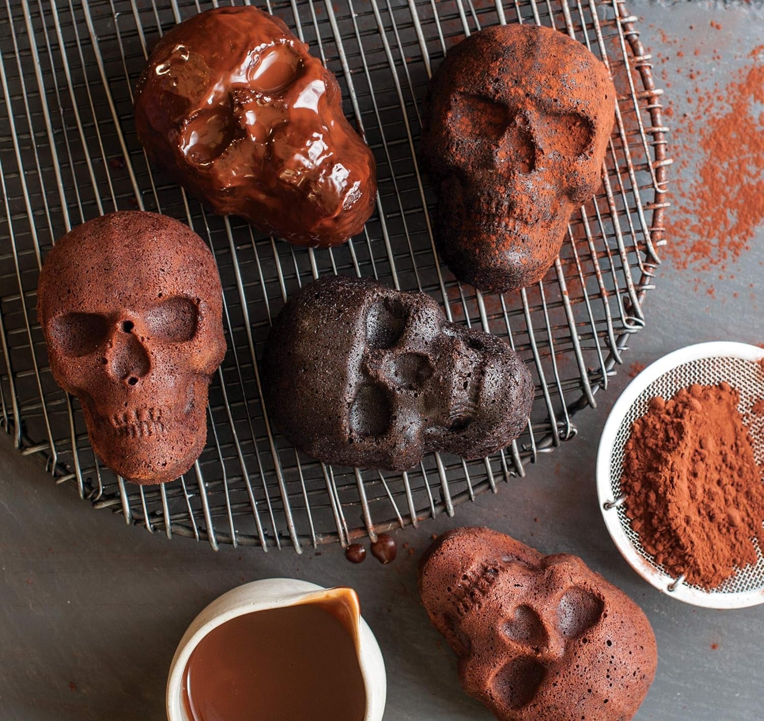 "Spooktacular Haunted Skull Cakelet Pan - Perfect for Halloween Baking!"